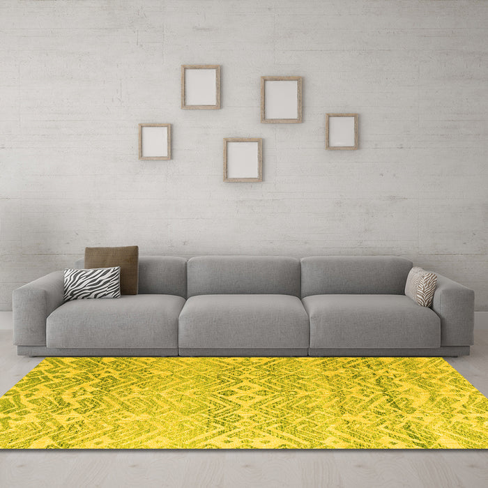 Machine Washable Solid Yellow Modern Rug in a Living Room, wshabs4754yw