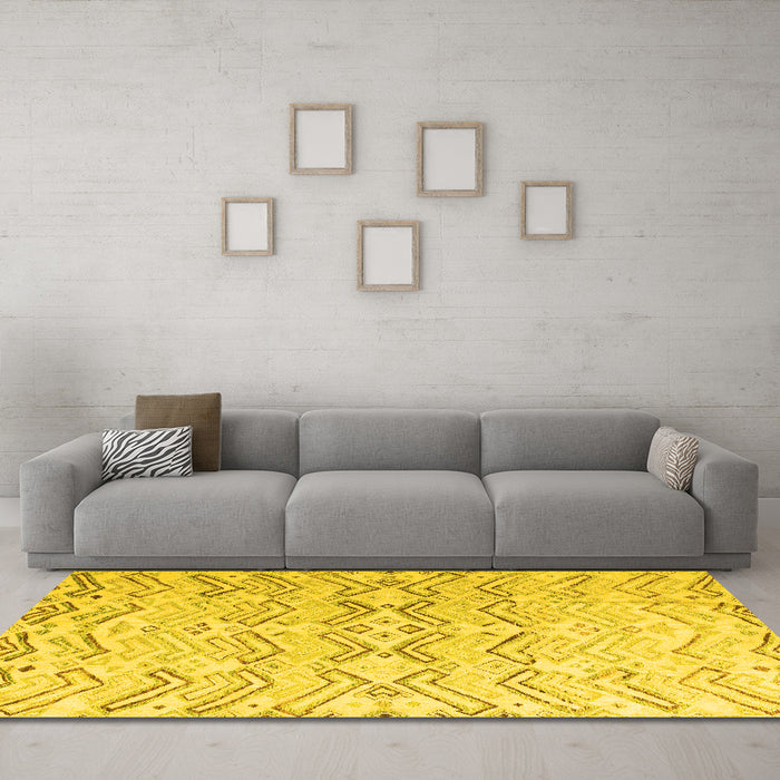 Machine Washable Solid Yellow Modern Rug in a Living Room, wshabs4776yw