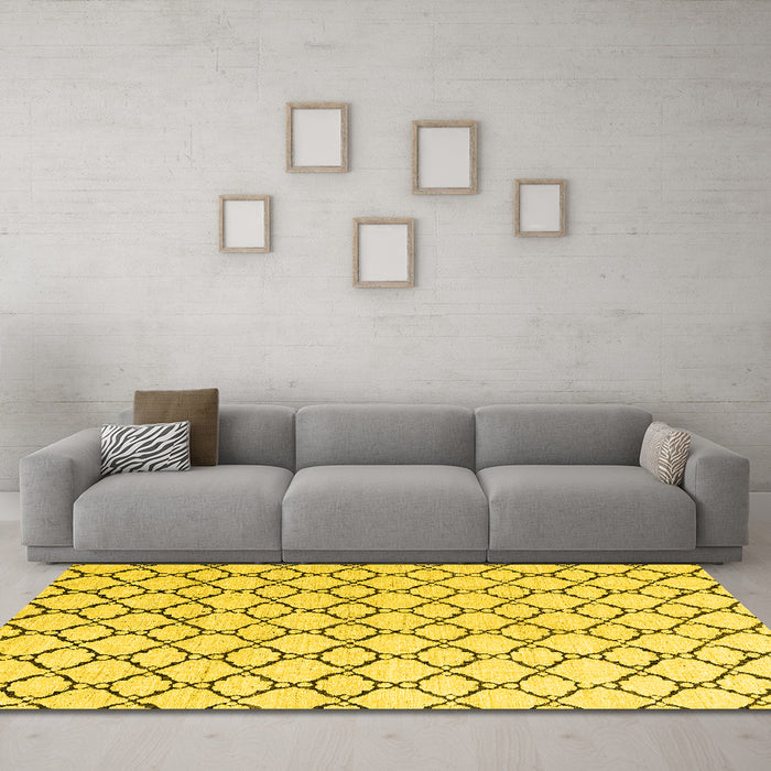 Machine Washable Solid Yellow Modern Rug in a Living Room, wshabs4781yw