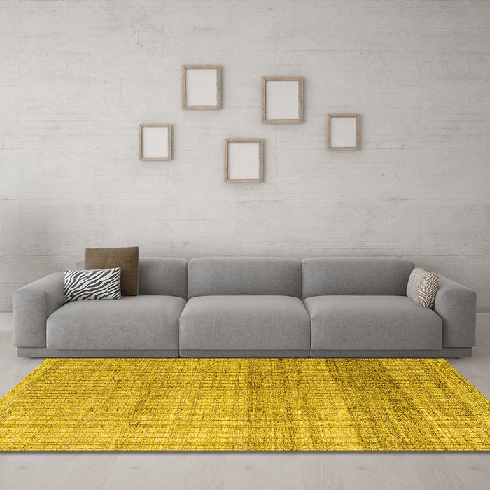 Machine Washable Solid Yellow Modern Rug in a Living Room, wshabs4791yw