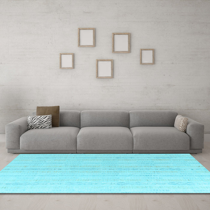 Machine Washable Solid Light Blue Modern Rug in a Living Room, wshabs4812lblu