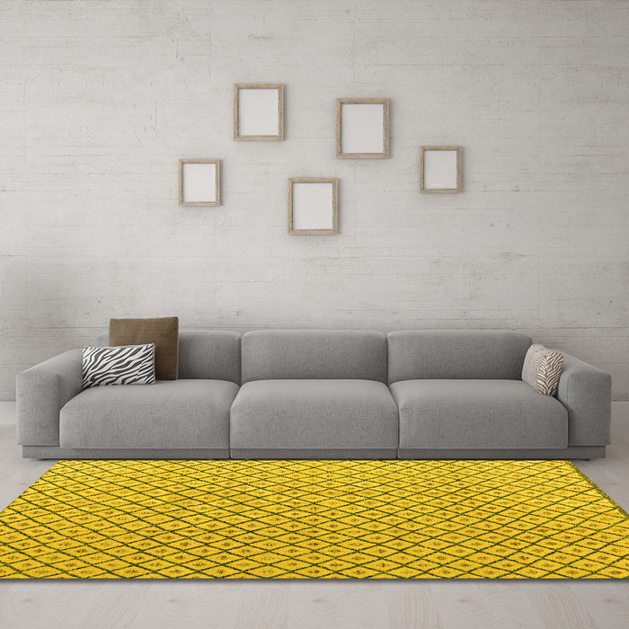 Machine Washable Solid Yellow Modern Rug in a Living Room, wshabs4815yw