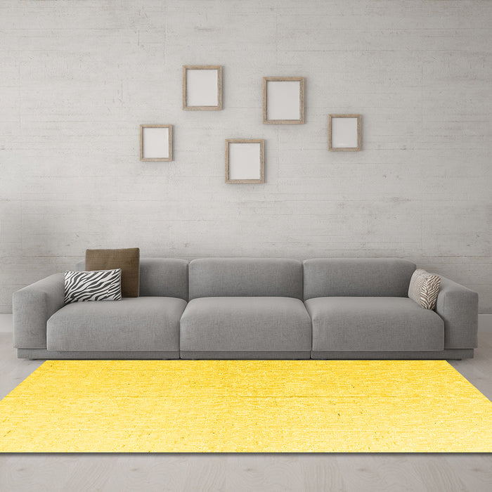 Machine Washable Solid Yellow Modern Rug in a Living Room, wshabs4817yw