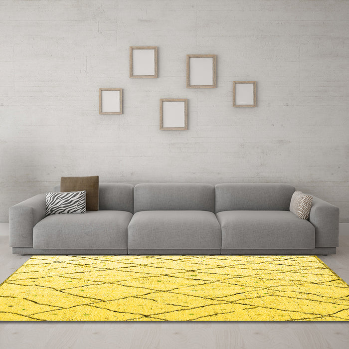 Machine Washable Solid Yellow Modern Rug in a Living Room, wshabs4851yw