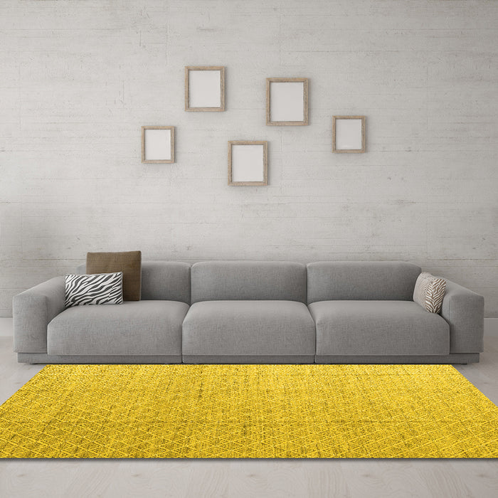 Machine Washable Solid Yellow Modern Rug in a Living Room, wshabs4864yw