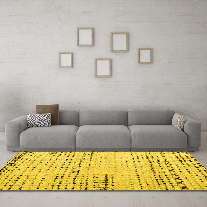 Machine Washable Solid Yellow Modern Rug in a Living Room, wshabs4896yw