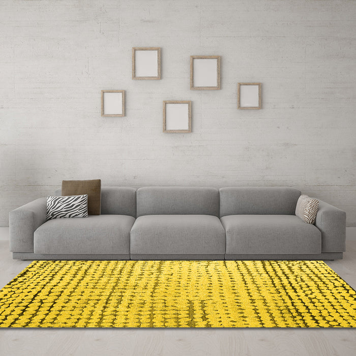Machine Washable Solid Yellow Modern Rug in a Living Room, wshabs4897yw