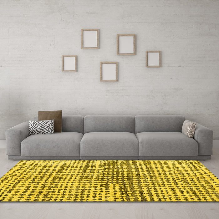 Machine Washable Solid Yellow Modern Rug in a Living Room, wshabs4900yw