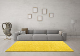 Machine Washable Solid Yellow Modern Rug in a Living Room, wshabs4910yw