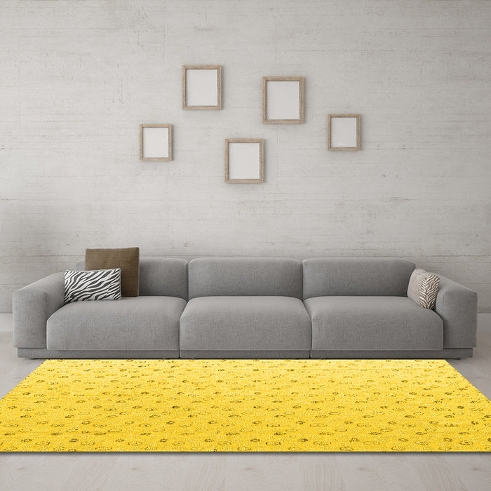 Machine Washable Solid Yellow Modern Rug in a Living Room, wshabs4921yw