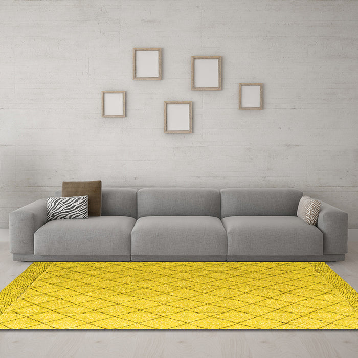 Machine Washable Solid Yellow Modern Rug in a Living Room, wshabs4930yw