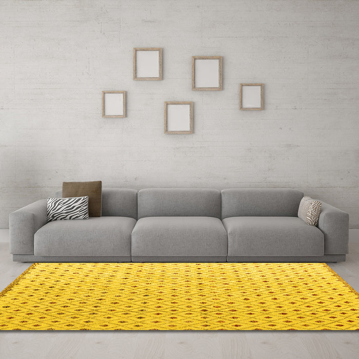 Machine Washable Solid Yellow Modern Rug in a Living Room, wshabs4932yw