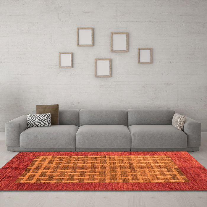 Machine Washable Abstract Orange Modern Area Rugs in a Living Room, wshabs4948org