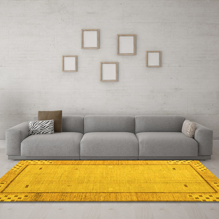 Machine Washable Abstract Yellow Modern Rug in a Living Room, wshabs4950yw