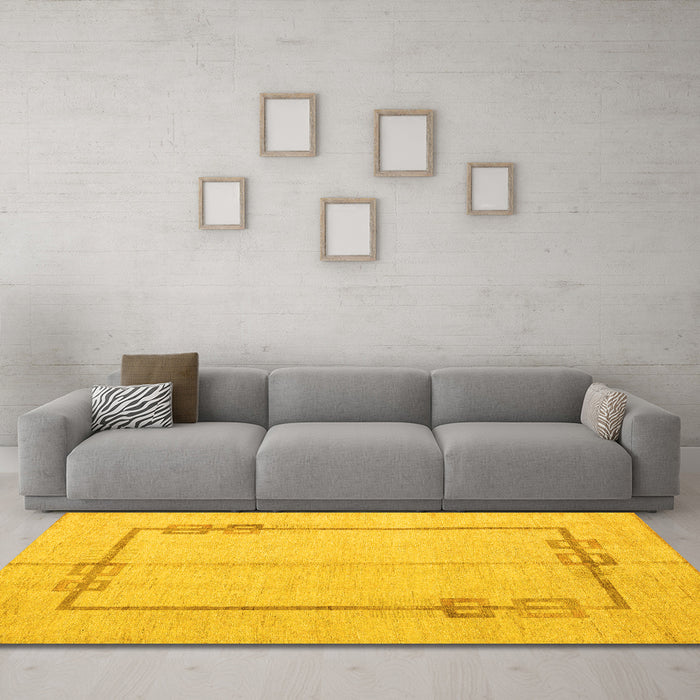 Machine Washable Solid Yellow Modern Rug in a Living Room, wshabs4956yw