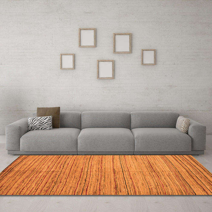 Machine Washable Abstract Orange Modern Area Rugs in a Living Room, wshabs4963org