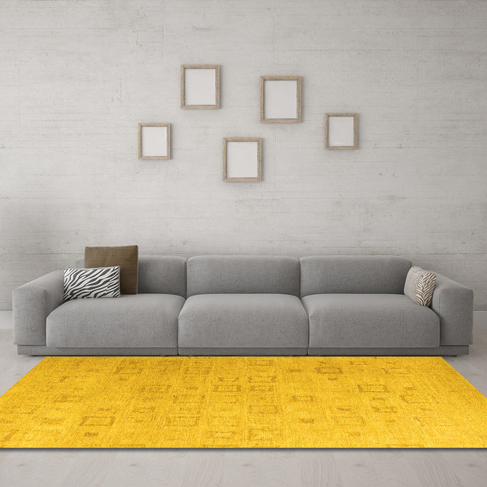 Machine Washable Solid Yellow Modern Rug in a Living Room, wshabs4972yw