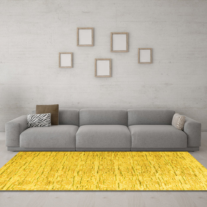 Machine Washable Solid Yellow Modern Rug in a Living Room, wshabs4985yw
