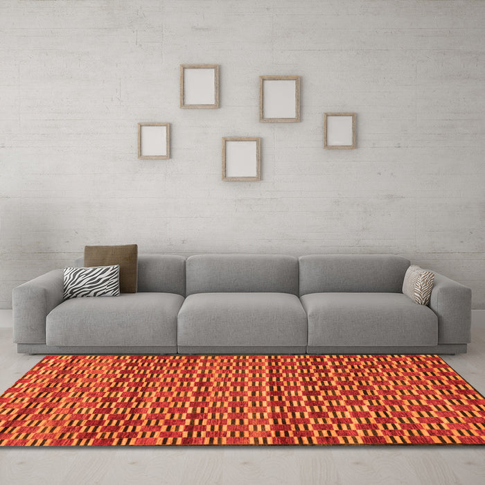 Machine Washable Abstract Orange Modern Area Rugs in a Living Room, wshabs4org