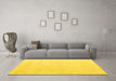 Machine Washable Solid Yellow Modern Rug in a Living Room, wshabs5004yw