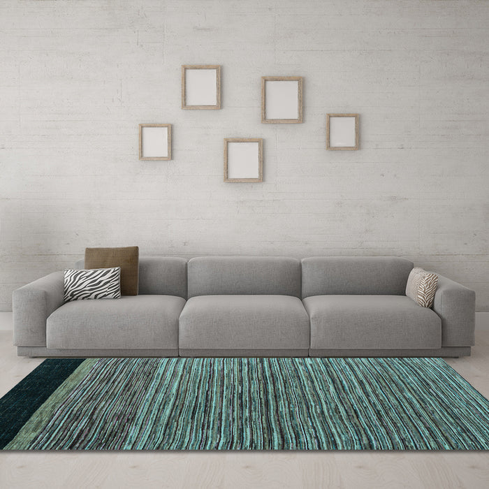 Machine Washable Oriental Light Blue Modern Rug in a Living Room, wshabs5032lblu