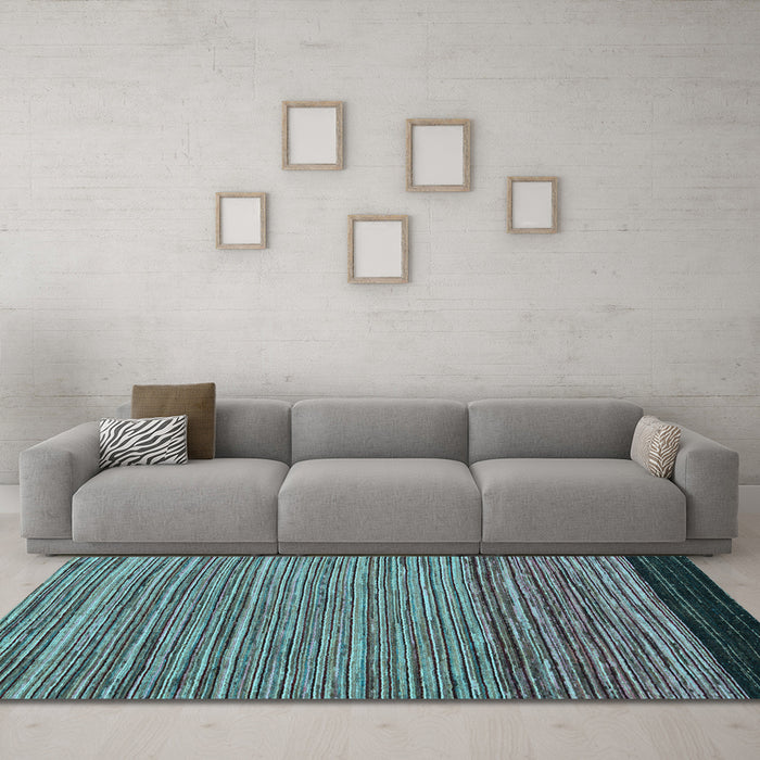 Machine Washable Oriental Light Blue Modern Rug in a Living Room, wshabs5033lblu