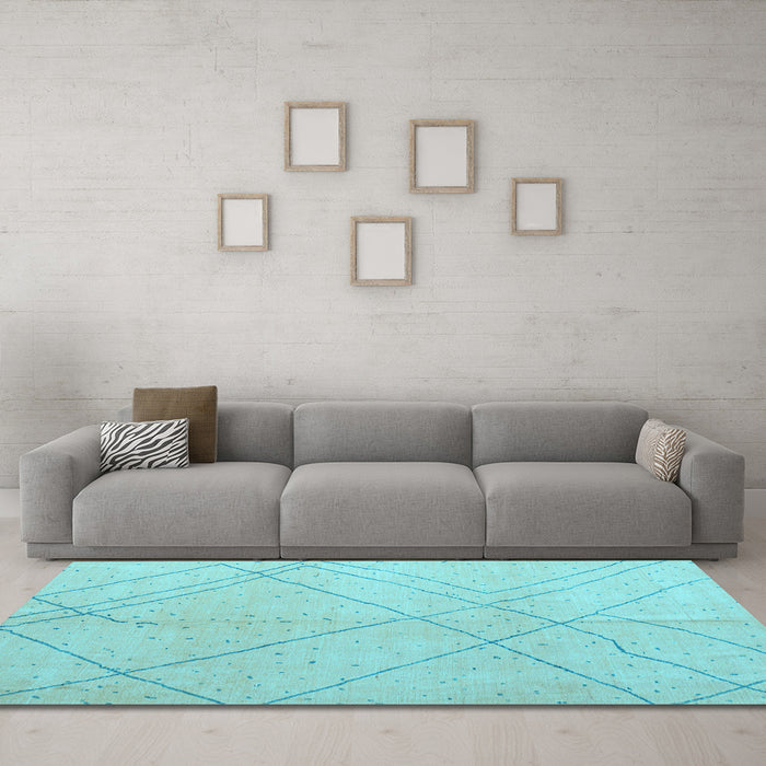 Machine Washable Oriental Light Blue Modern Rug in a Living Room, wshabs5034lblu