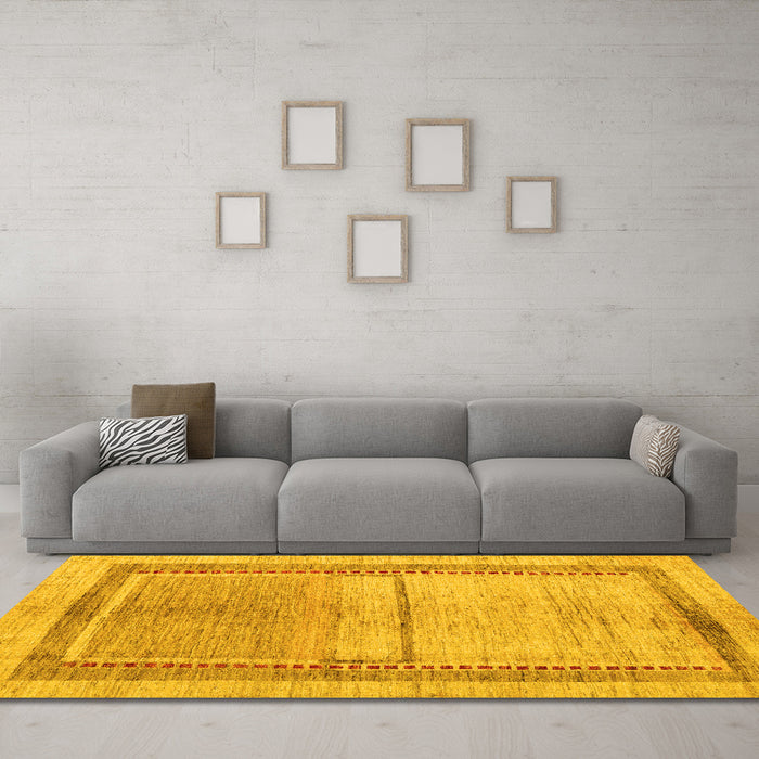 Machine Washable Oriental Yellow Modern Rug in a Living Room, wshabs5040yw