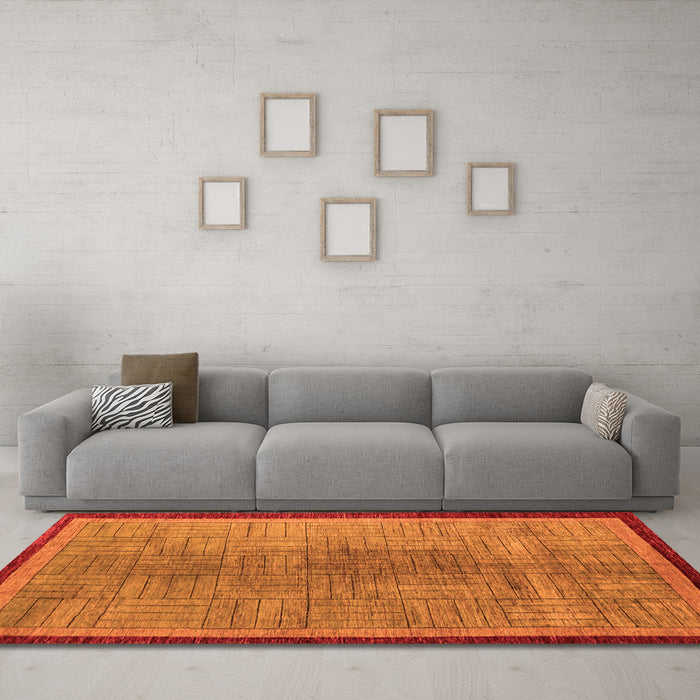Machine Washable Abstract Orange Modern Area Rugs in a Living Room, wshabs5053org