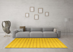 Machine Washable Solid Yellow Modern Rug in a Living Room, wshabs5056yw