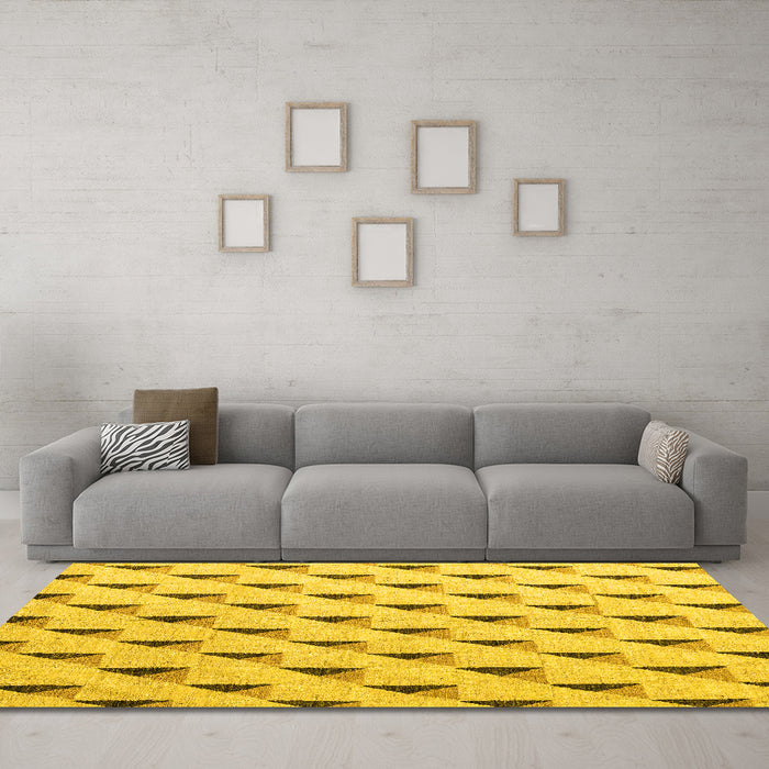 Machine Washable Solid Yellow Modern Rug in a Living Room, wshabs5069yw