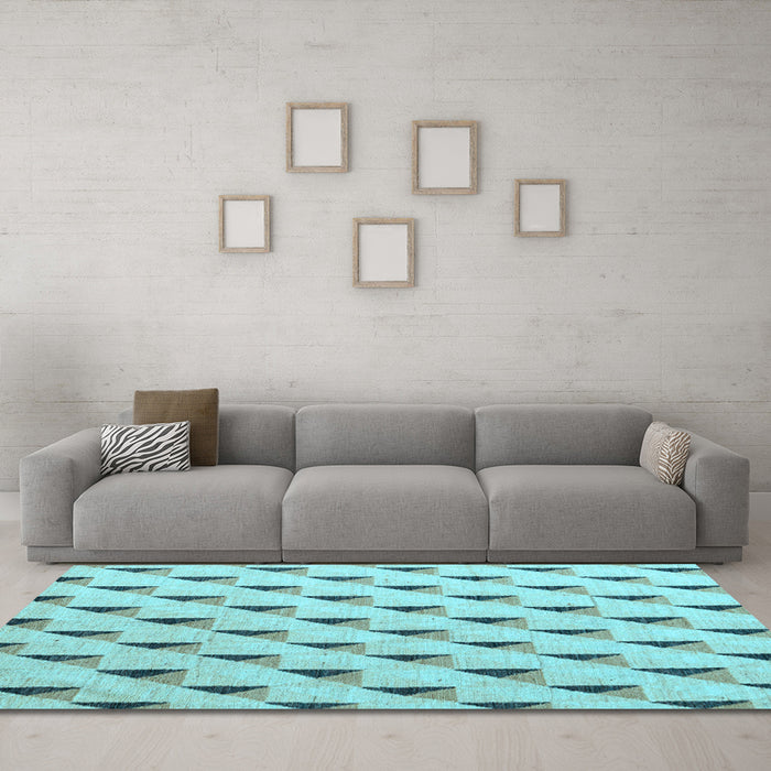 Machine Washable Solid Light Blue Modern Rug in a Living Room, wshabs5069lblu