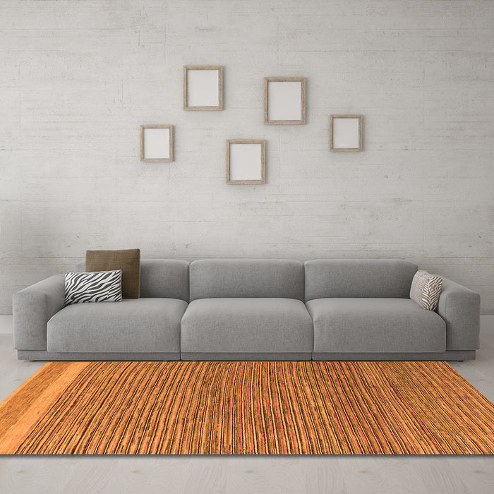 Machine Washable Abstract Orange Modern Area Rugs in a Living Room, wshabs5153org