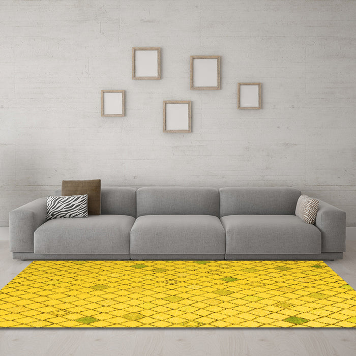Machine Washable Solid Yellow Modern Rug in a Living Room, wshabs5170yw