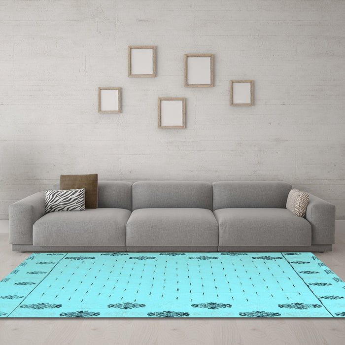 Machine Washable Solid Light Blue Modern Rug in a Living Room, wshabs5171lblu