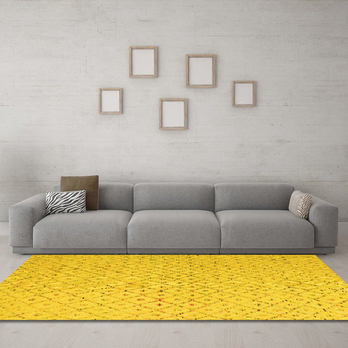 Machine Washable Solid Yellow Modern Rug in a Living Room, wshabs5182yw