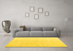 Machine Washable Solid Yellow Modern Rug in a Living Room, wshabs5234yw