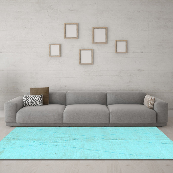 Machine Washable Solid Light Blue Modern Rug in a Living Room, wshabs5245lblu
