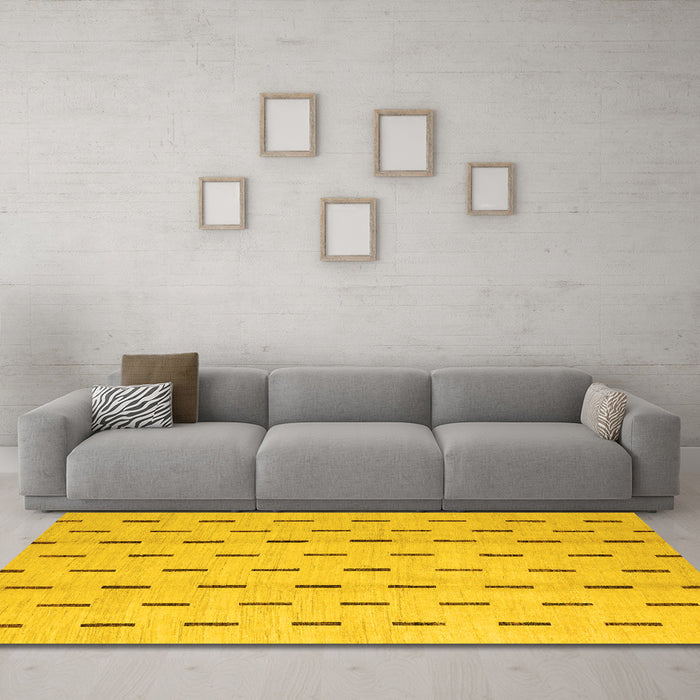 Machine Washable Solid Yellow Modern Rug in a Living Room, wshabs5261yw
