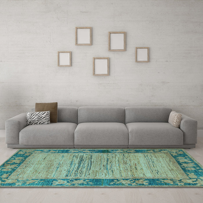 Machine Washable Oriental Light Blue Modern Rug in a Living Room, wshabs5285lblu