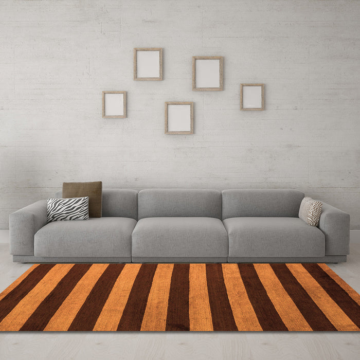 Machine Washable Abstract Orange Modern Area Rugs in a Living Room, wshabs5299org
