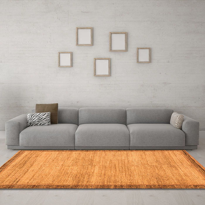 Machine Washable Abstract Orange Modern Area Rugs in a Living Room, wshabs5307org