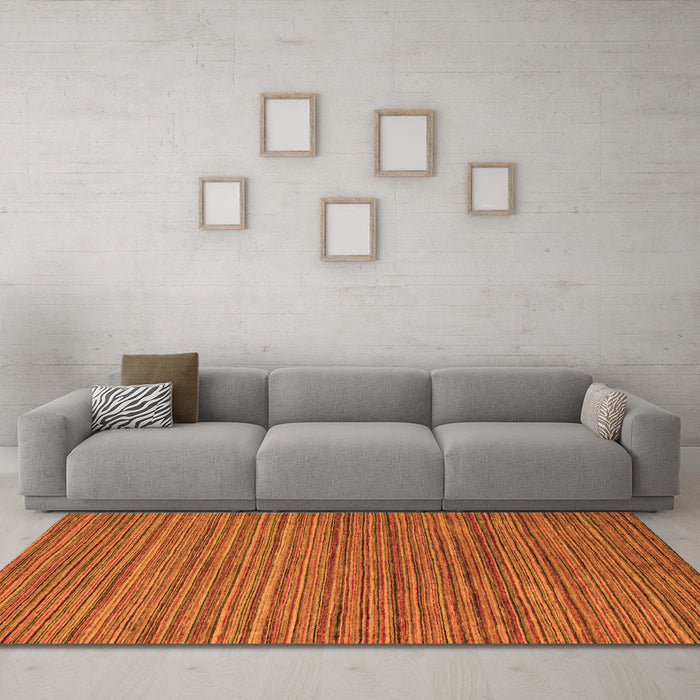 Machine Washable Abstract Orange Modern Area Rugs in a Living Room, wshabs5310org