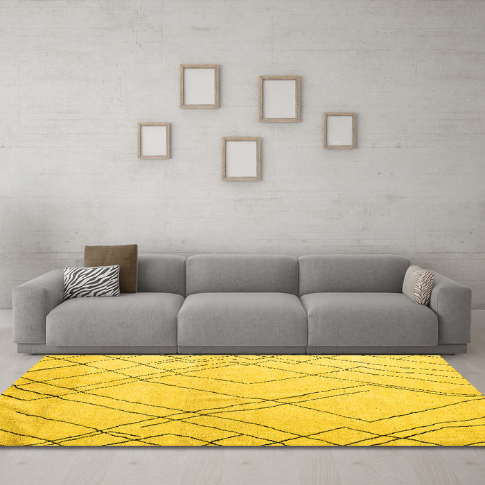Machine Washable Solid Yellow Modern Rug in a Living Room, wshabs5328yw