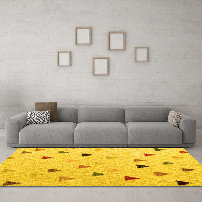Machine Washable Solid Yellow Modern Rug in a Living Room, wshabs5347yw