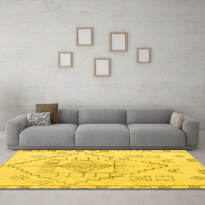 Machine Washable Solid Yellow Modern Rug in a Living Room, wshabs5351yw