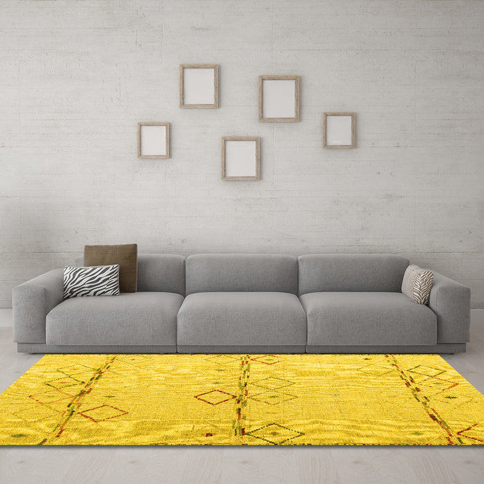 Machine Washable Solid Yellow Modern Rug in a Living Room, wshabs5354yw