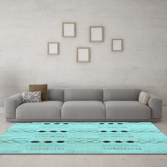 Machine Washable Solid Light Blue Modern Rug in a Living Room, wshabs5355lblu