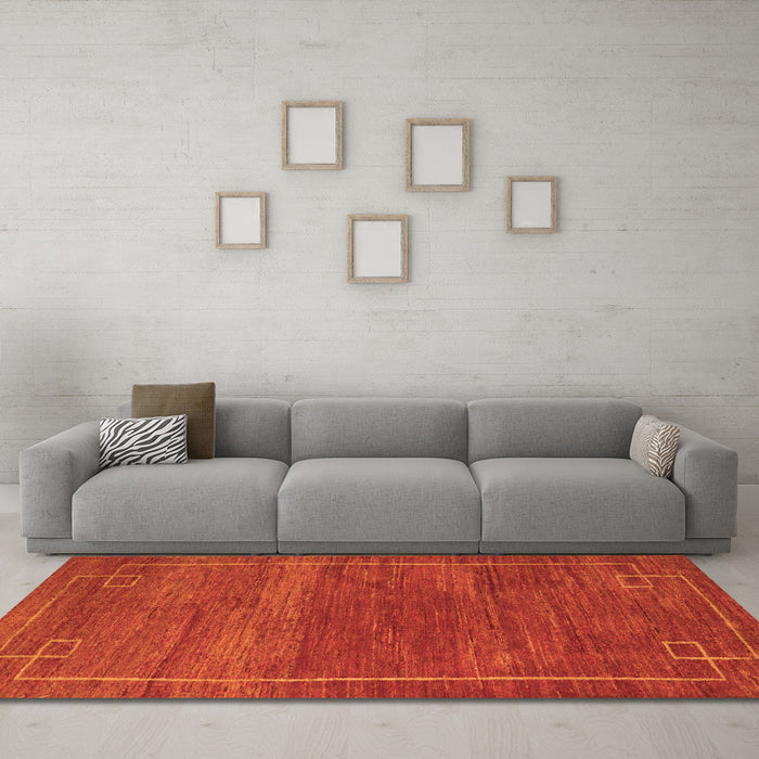 Machine Washable Abstract Orange Modern Area Rugs in a Living Room, wshabs5397org