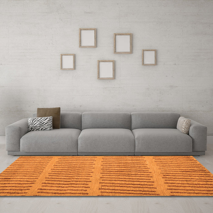 Machine Washable Solid Orange Modern Area Rugs in a Living Room, wshabs5440org